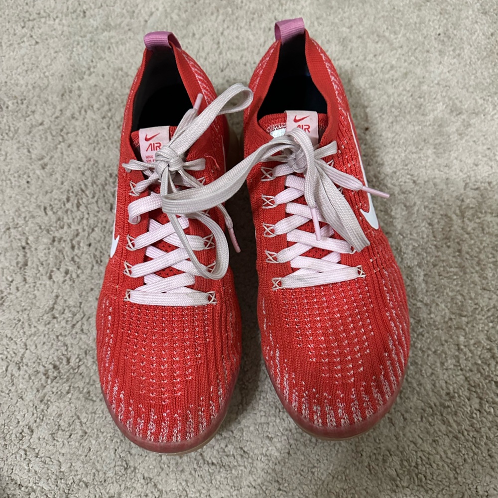 Women’s Red, white, and pink Nike Vapormax